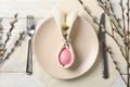 Easter table setting on white wooden background Royalty Free Stock Photo