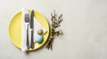 Easter Table Setting with Eggs and Blossoms. Royalty Free Stock Photo