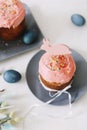 Easter table with Easter cakes, painted eggs and tree branches. Kulich decorated with icing.  Happy Easter concept Royalty Free Stock Photo