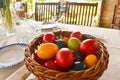 Easter tablewear outdoor under the pergola with colorful eggs in a sunny day Royalty Free Stock Photo