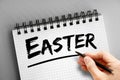Easter text on notepad, concept background Royalty Free Stock Photo