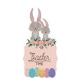 Easter time frame with bunnies couple on top and easter eggs and ornament floral in colorful silhouette