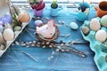 Easter toy chicken, eggs on a wooden windowsill, spring, festive home decor Royalty Free Stock Photo