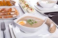 Easter traditional breakfast with white borsch soup