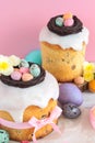 Easter traditional cake with chocolate nest, candy and quail eggs decoration blossom flowers. Close up