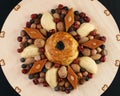 Easter and traditional sweets baklava, shekerbura, gogal ,nuts , dates on wooden table.