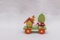 Easter train and egg-house, duckling, mushrooms, a tree in flowers and a white fence - wooden holiday transport toy Royalty Free Stock Photo
