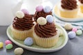 Easter vanilla cupcakes with chocolate frosting Royalty Free Stock Photo