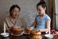 Easter. Very old grandmother and granddaughter