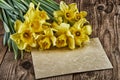 Easter Vintage Style yellow flowers with paper sheet Royalty Free Stock Photo