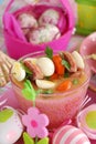 Easter white borscht with quail eggs and sausage in pink glass