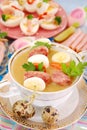 Easter white borsht with quil eggs and sausage