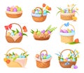 Easter wicker baskets. Straw basket with painted decorative eggs, spring flowers gift bow ribbon, colorful egg in brown Royalty Free Stock Photo