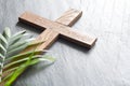 Easter wooden cross on black marble background religion abstract palm sunday concept Royalty Free Stock Photo