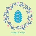 Easter wreath with colorful egg and leaves on pastel background Royalty Free Stock Photo