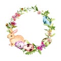 Easter wreath with easter bunny, colored eggs in grass, flowers. Circle border. Watercolor
