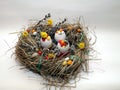 Easter wreath made of a hay with willow branches and filled egg shells Royalty Free Stock Photo