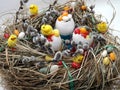 Easter wreath made of a hay with willow branches and filled egg shells Royalty Free Stock Photo