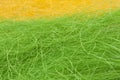Easter yellow and green straw background Royalty Free Stock Photo
