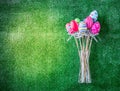 Easter eggs painted decoration with colourful on green grass background