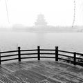 Eastern Asian Eastern landscape pavilions, terraces and open halls spring willow waterscape water waterside pavilion misty partly Royalty Free Stock Photo