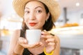 Eastern or asian girl drinking tea or coffee inside a cafe Royalty Free Stock Photo