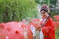 Aisa Chinese woman Peking Beijing Opera Costumes Pavilion garden China traditional role drama play bride hold red Umbrella