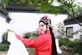 Aisa Chinese woman Peking Beijing Opera Costumes Pavilion garden China traditional role drama play bride dance perform Royalty Free Stock Photo