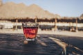 Eastern black tea in glass on a eastern carpet. Eastern tea concept. Armudu traditional cup Royalty Free Stock Photo