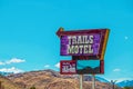 Trails Motel retro sign with Sierra Mountains in background - Copy Space