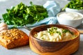 Eastern european dumplings, vareniki with sour cream with parsley Royalty Free Stock Photo