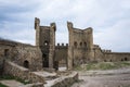 The Eastern Gate Tower of Genoese fortress of the 14th century in the Sudak bay on the Peninsula of Crimea Royalty Free Stock Photo