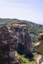 Eastern Orthodox Holy Monastery of Varlaam is sheltered on a sheer cliff in Meteora, Greece.