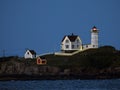 Eastern Point Lighthouse lit up in Gloucester Harbor Massachusetts Royalty Free Stock Photo