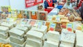 Eastern sweets at the fair. Text in Russian: halva sherbet marmalade dairy products Royalty Free Stock Photo