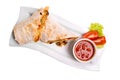 Eastern traditional shawarma plate with sauce isolated on white.