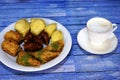 Eastern Turkish sweets baklava and cup of coffee Royalty Free Stock Photo