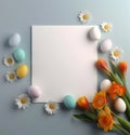Easters and flowers spread around the white copy space frame. Top down view