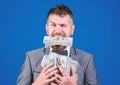 Easy cash loan. Man formal suit hold many dollar banknotes blue background. Businessman got cash money. Take my money Royalty Free Stock Photo