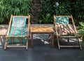 Easy chairs in garden Royalty Free Stock Photo