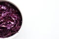 Easy homecooked coleslaw from red cabbage in a bowl on white table background. Top view, copy space. Fresh vegetable salad. Royalty Free Stock Photo