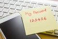 Easy number password note stick on smartphone, keyboard Royalty Free Stock Photo