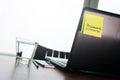 Easy password on sticky note on back Laptop Royalty Free Stock Photo