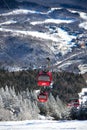 Easy way Gondola lift at Stowe Ski Resort in Vermont, view to the Spruce Peak village Royalty Free Stock Photo