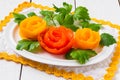 An easy way to decorate the festive dishes - roses from tomatoes