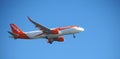 EasyJet airplane flying at blue sky