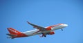 EasyJet airplane flying at blue sky