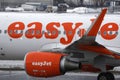 Easyjet landing in Innsbruck Airport, INN, snow in winter Royalty Free Stock Photo