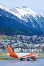 Easyjet plane taxiings in Innsbruck Airport, INN, mountains