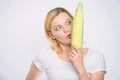 Eat corn benefits. Healthy food concept. Woman hold yellow corn cob white background. Corn harvest. Girl hold ripe corn